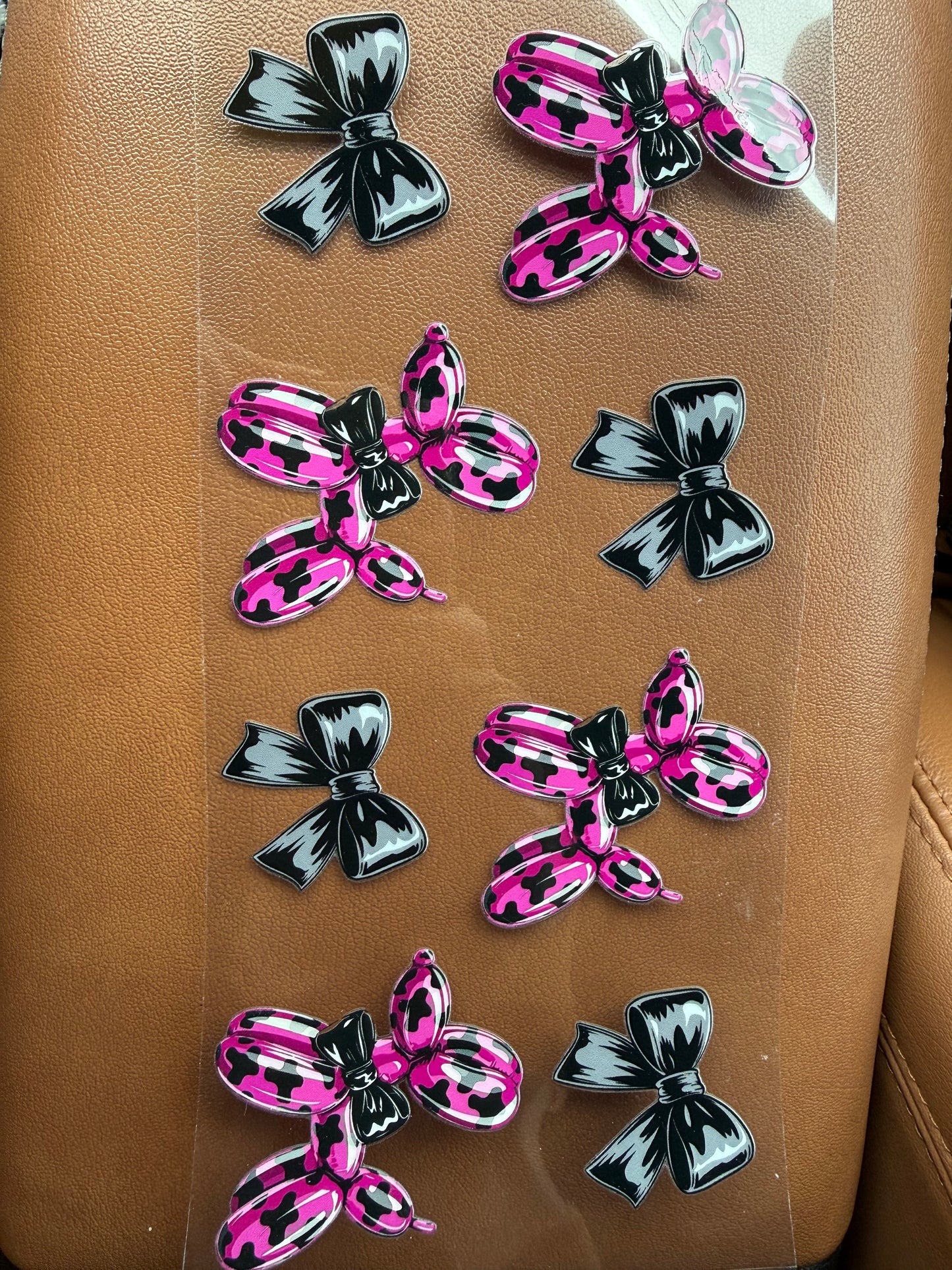 Pink leopard balloon dogs & black/grey bows