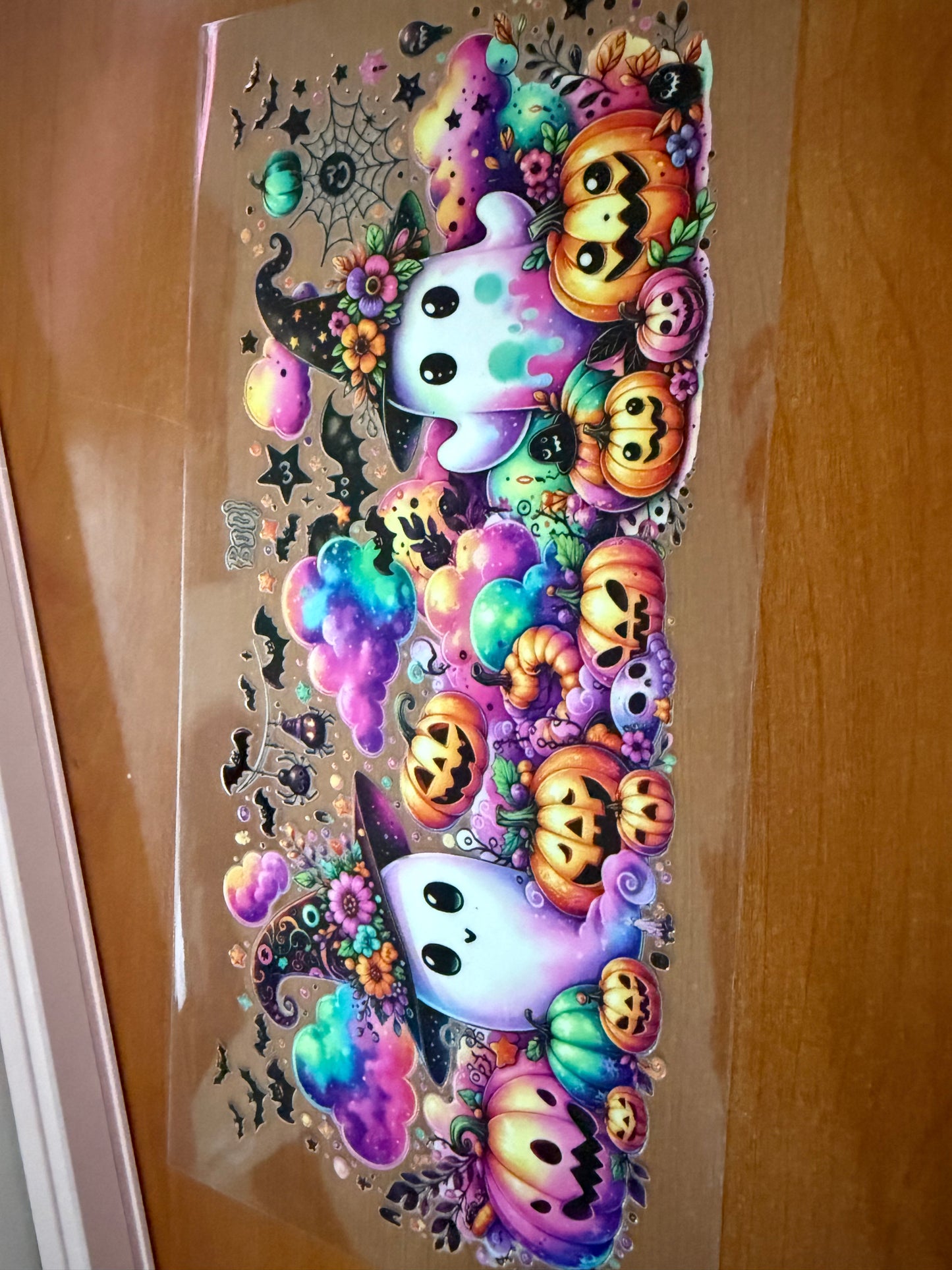 Colorful ghosts and pumpkins