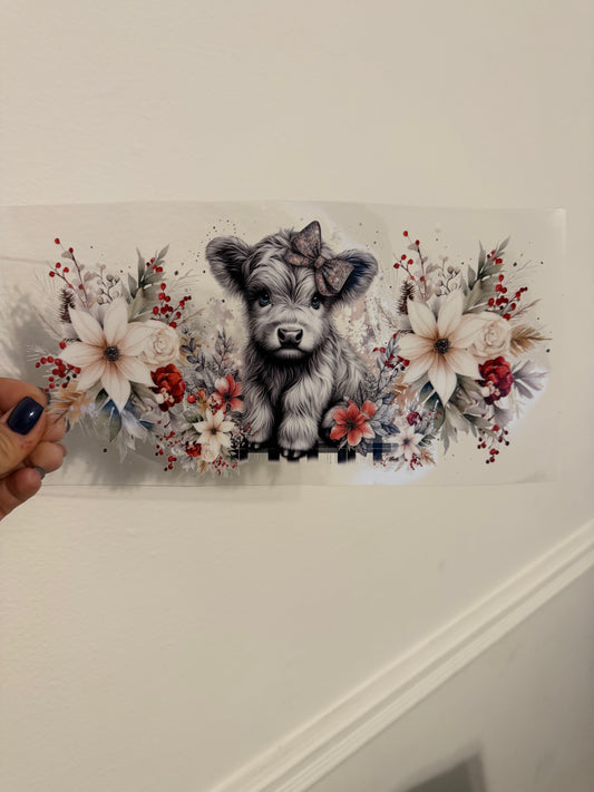 highland cow with flowers