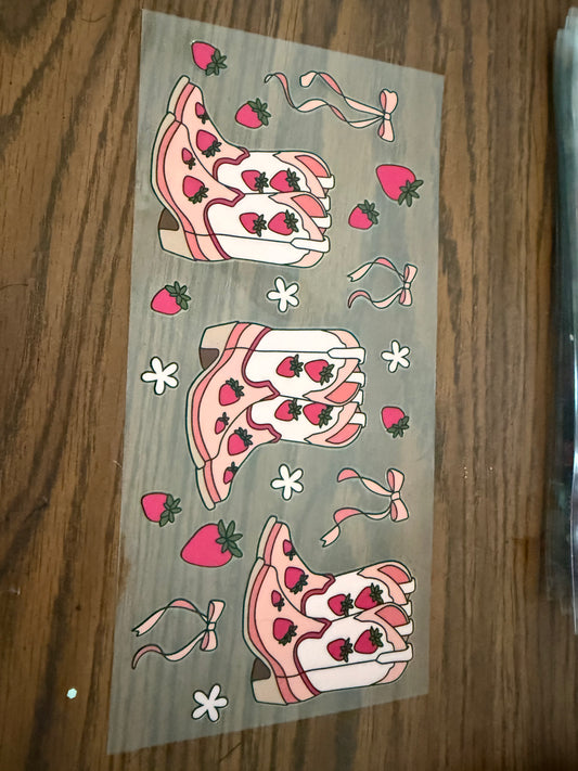 Cowboy boots with strawberries and bows