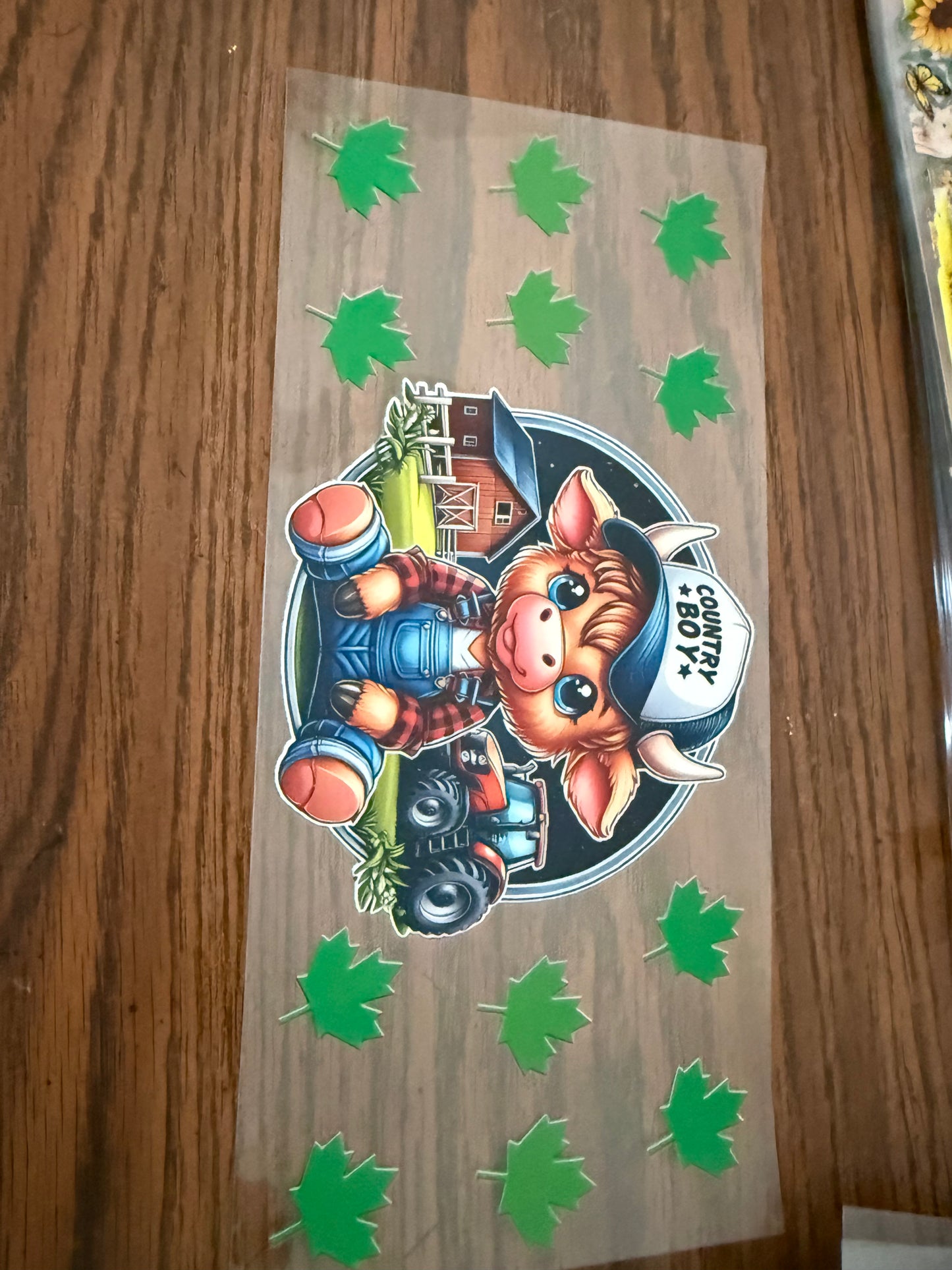 country boy cow with green leaves