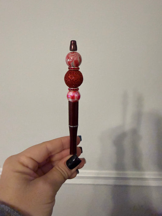 Black pen with red