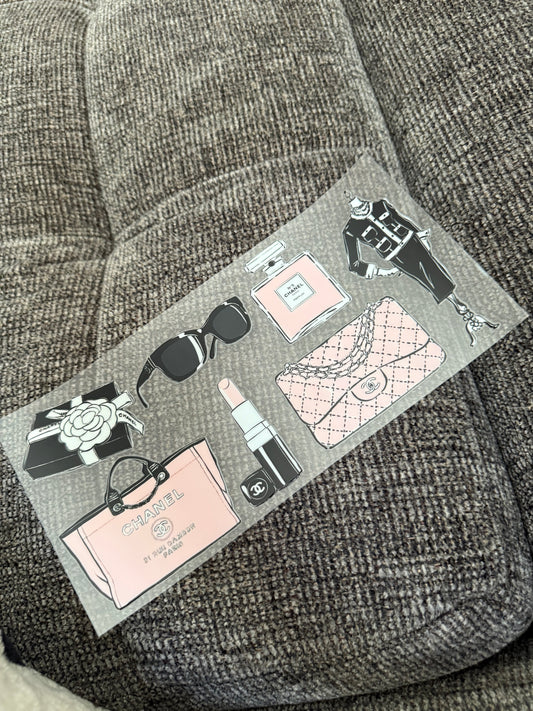 Purse, lipstick, sunglasses