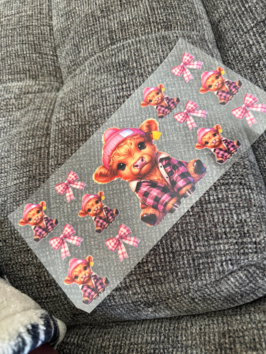 Highland cow with pink hat & flannel