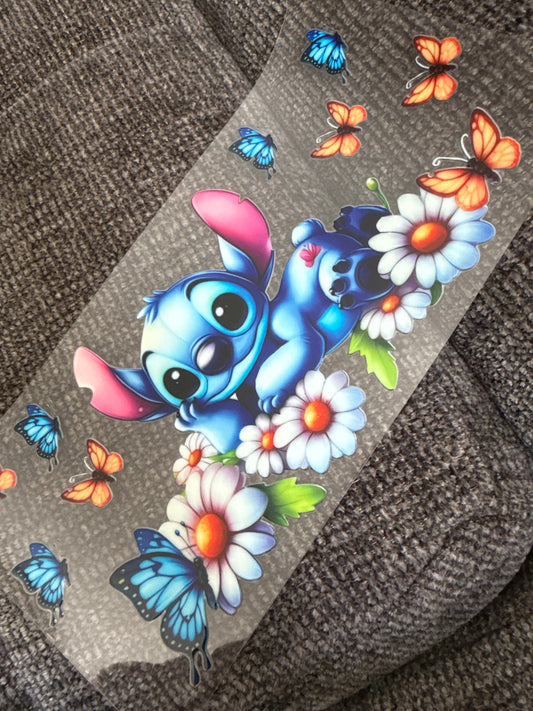 Blue alien and flowers