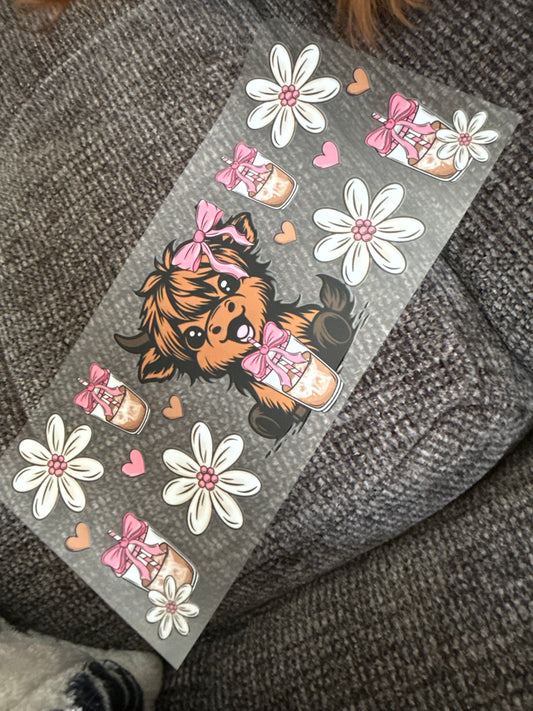 Baby cow with coffee & white flowers